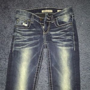 Dark colored Capri jeans